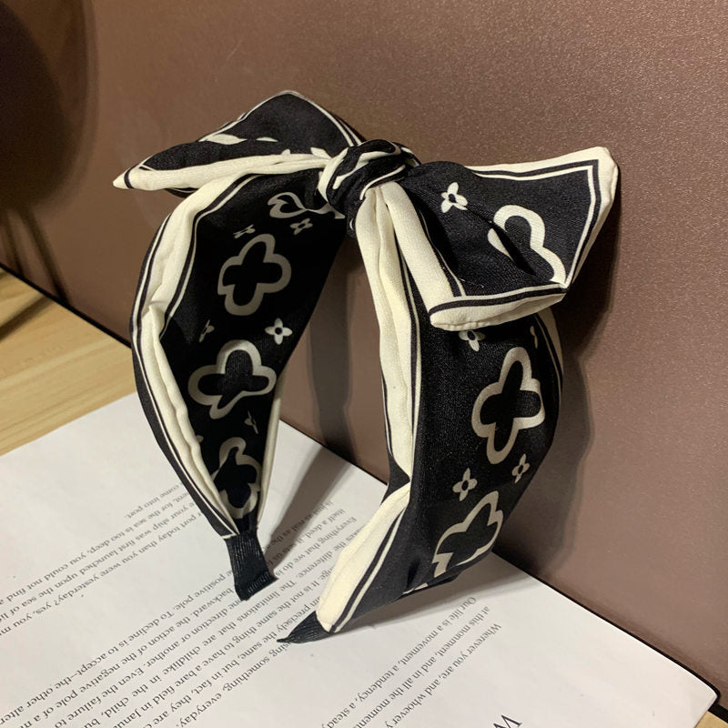 Korean style big bow headband women's cute simple wide face-looking small headband out hair-pressing grottoes internet influencer hairpin