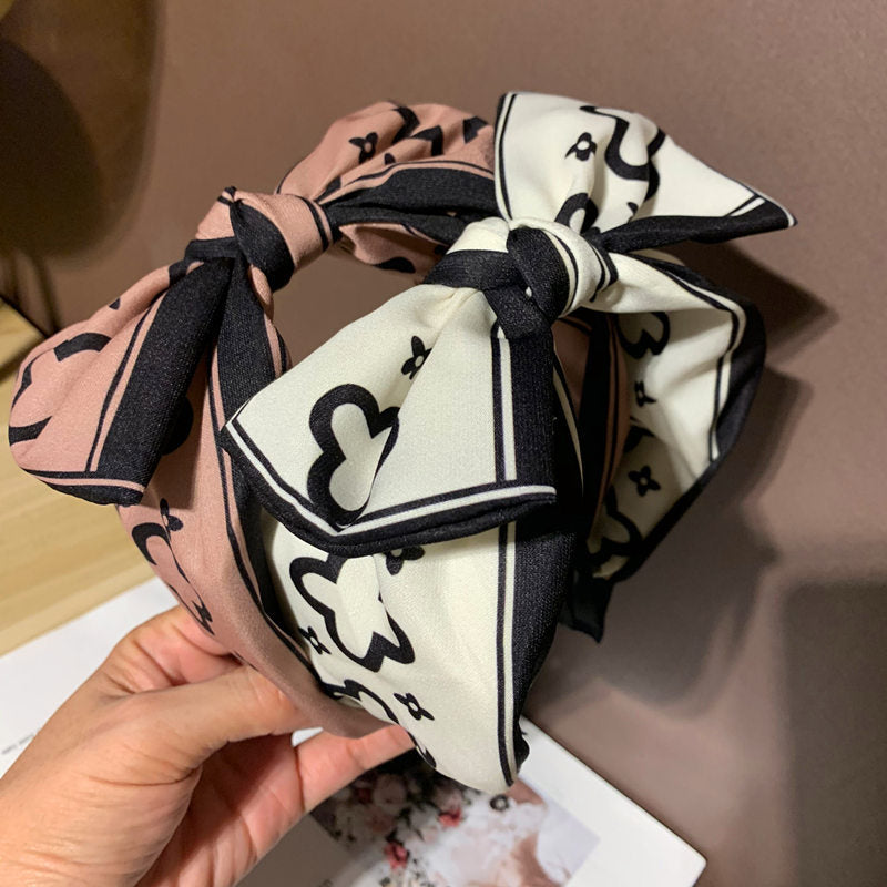 Korean style big bow headband women's cute simple wide face-looking small headband out hair-pressing grottoes internet influencer hairpin