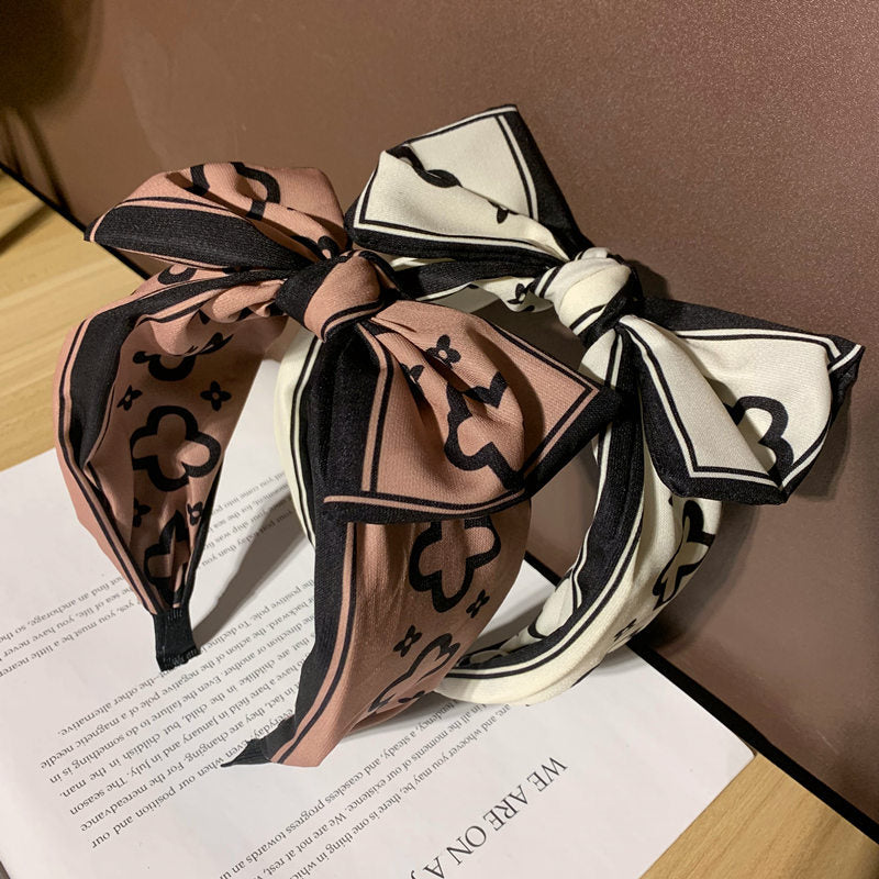 Korean style big bow headband women's cute simple wide face-looking small headband out hair-pressing grottoes internet influencer hairpin